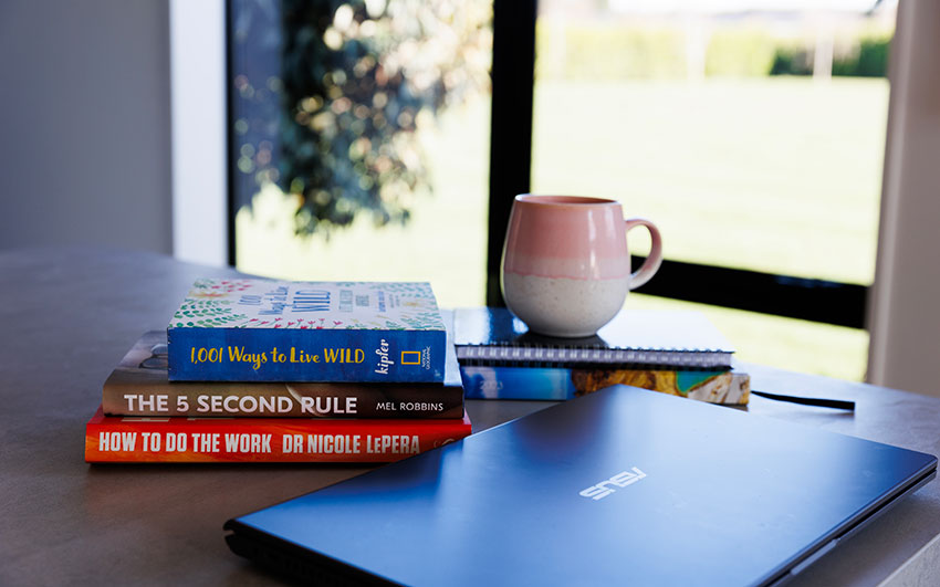 Self-help books on table